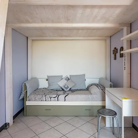 Tiziana Villa *